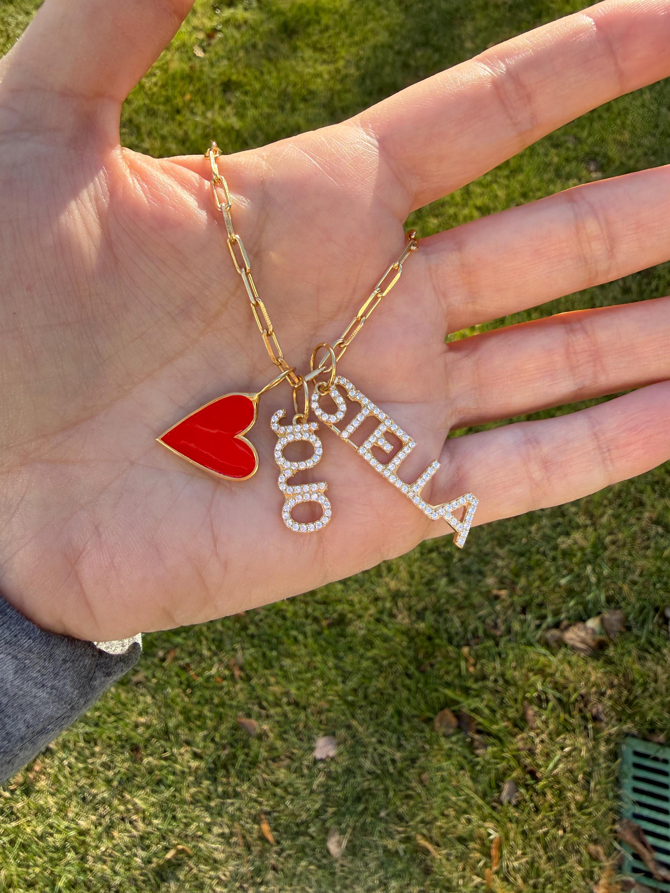 As seen on Stephanie Olivia. Personalized Pave Name Charms. Diamond Charms. CZ charms. Custom name charms. Enamel heart charm.