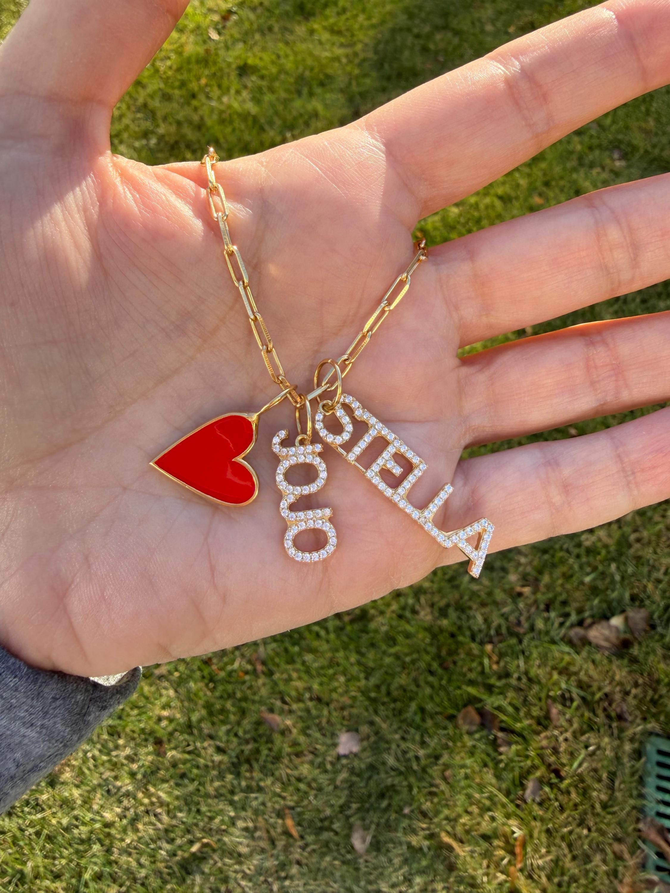 As seen on Stephanie Olivia. Personalized Pave Name Charms. Diamond Charms. CZ charms. Custom name charms. Enamel heart charm.