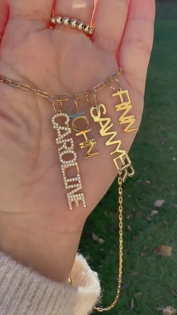 As seen on Caroline Baudino. Personalized Pave Name Charms. Diamond Charms. CZ charms. Custom name charms on Shop with Caroline.