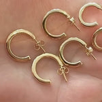 Half inch hollow hoop earrings/ hoops. 18K gold filled. Won’t tarnish. Gold filled hoops. Gold filled earrings. Small hoops. Mini hoops.